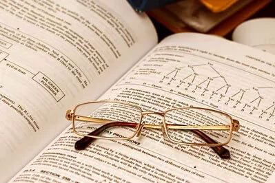 Image of spectacles on a book